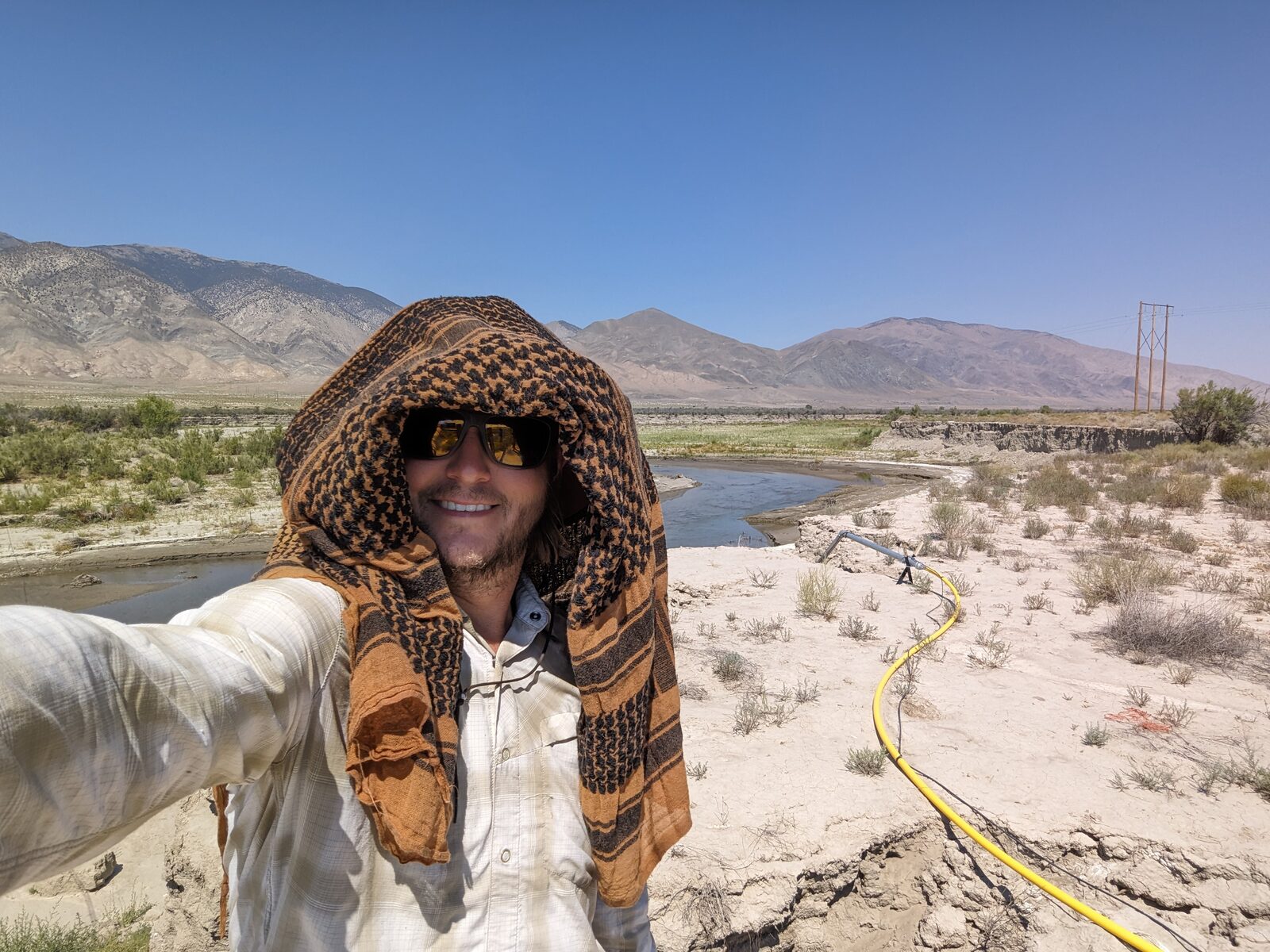 Daniel Riddle measuring discharge with a FlowTracker2 in a burned watershed
